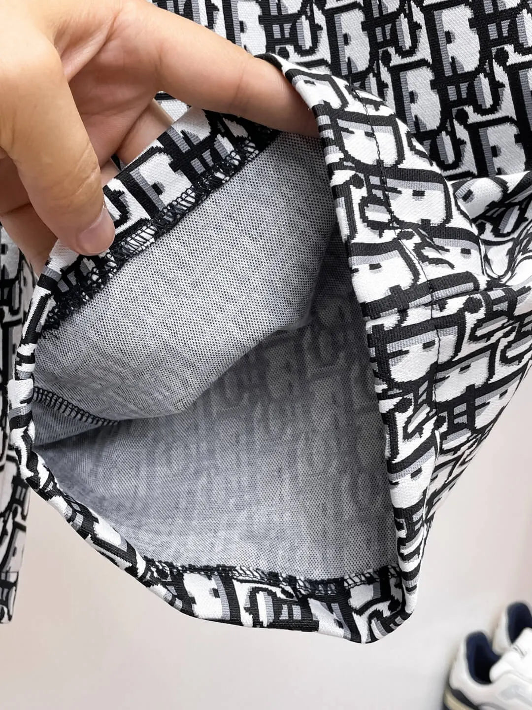All‑Over Monogram Print Spliced Shorts