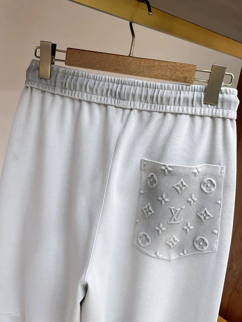 Embossed Monogram Patch Pocket Straight‑Leg Pants