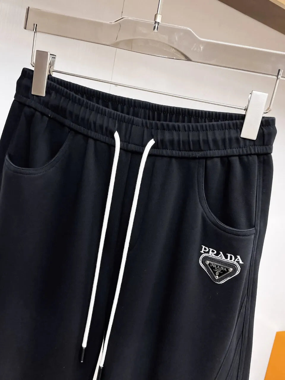 Triangle Badge Seam‑Detail Pants