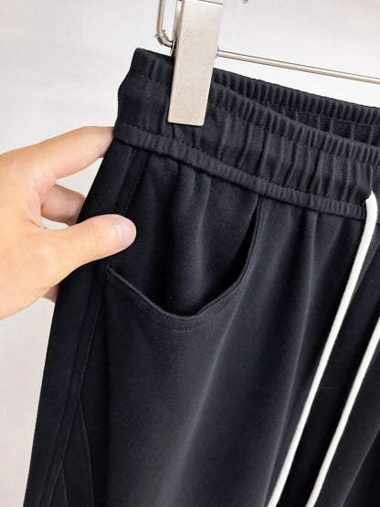 Triangle Badge Seam‑Detail Pants