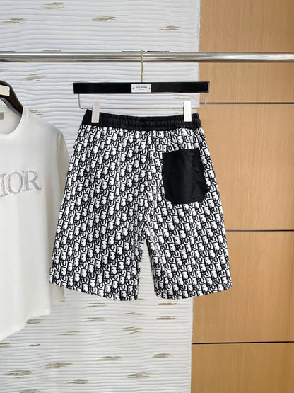 All‑Over Monogram Print Spliced Shorts