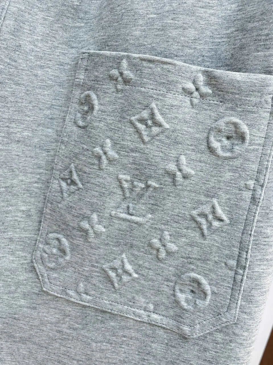 Embossed Monogram Patch Pocket Wide‑Leg Pants