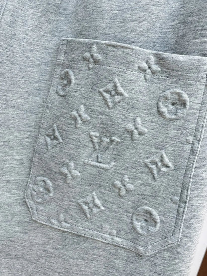 Embossed Monogram Patch Pocket Wide‑Leg Pants