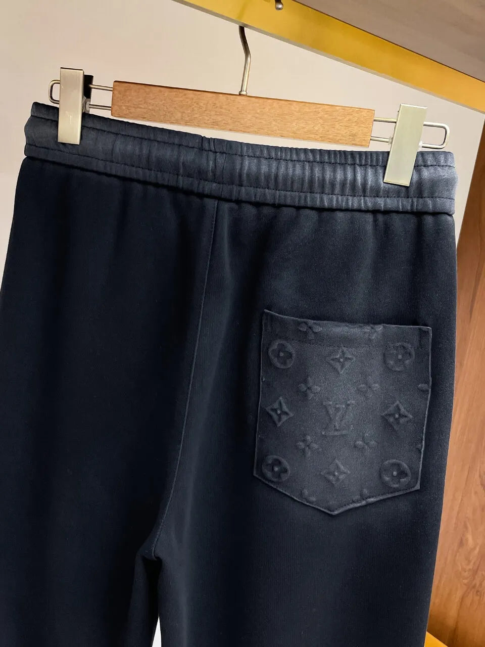 Embossed Monogram Patch Pocket Straight‑Leg Pants