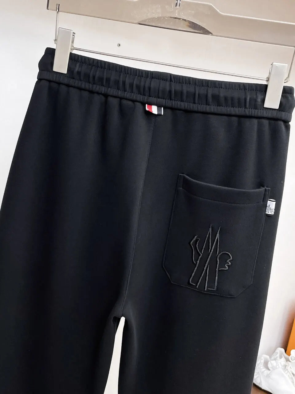 Chest Embroidered Badge Back‑Pocket Motif Pants