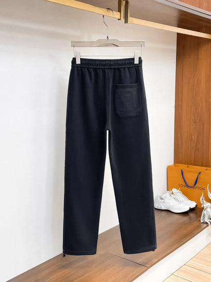 Side‑Embossed Letter Snap‑Detail Pants