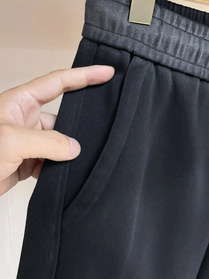 Embossed Monogram Patch Pocket Straight‑Leg Pants