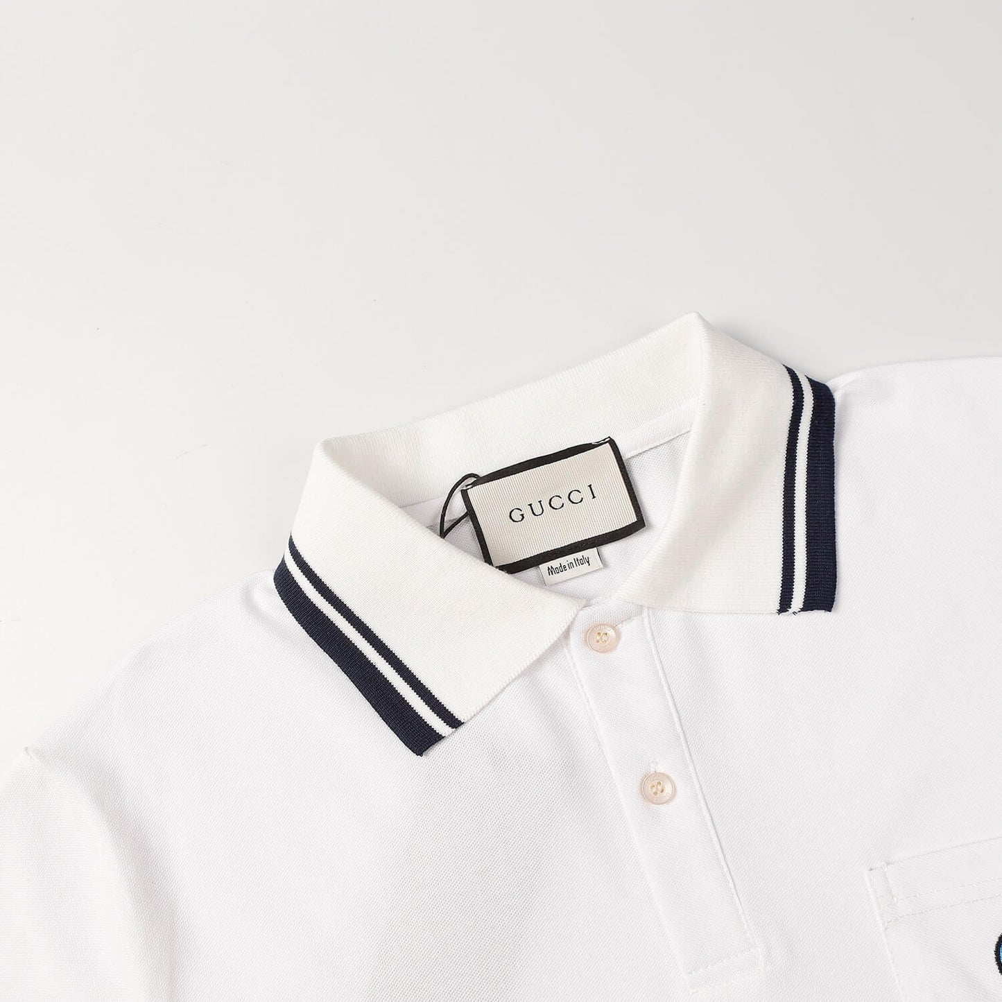Dual‑Eye Gaze‑Motif Embroidered Polo Shirt