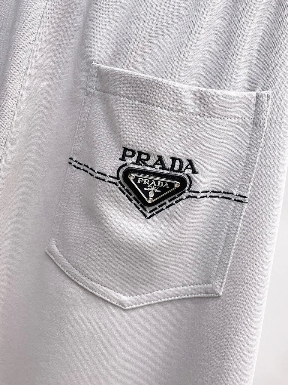 Triangle Badge Seam‑Detail Pants