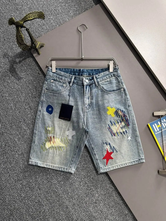 Star Cross Embroidered Distressed Denim Shorts