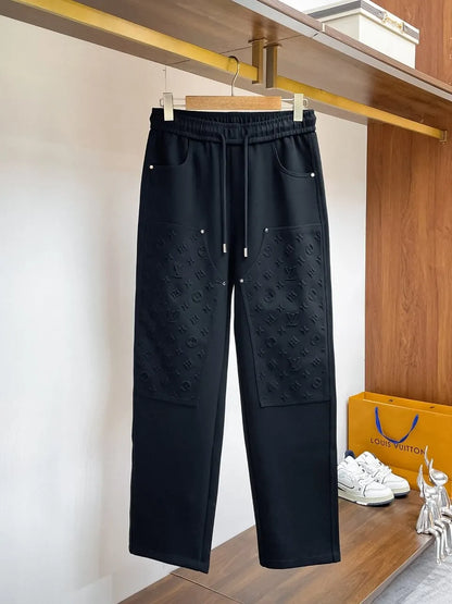 Embossed Monogram Patch Pocket Wide‑Leg Pants