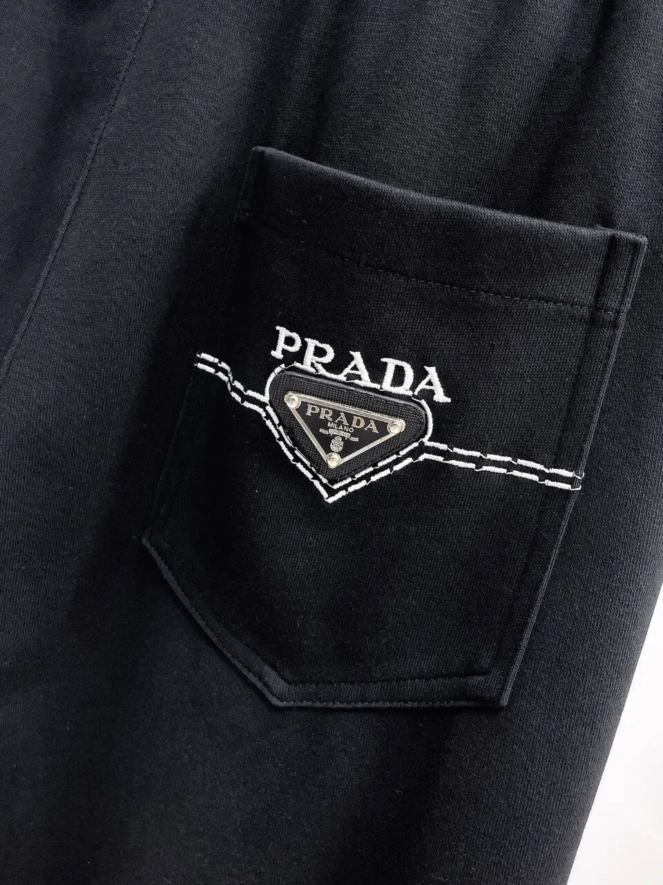 Triangle Badge Seam‑Detail Pants
