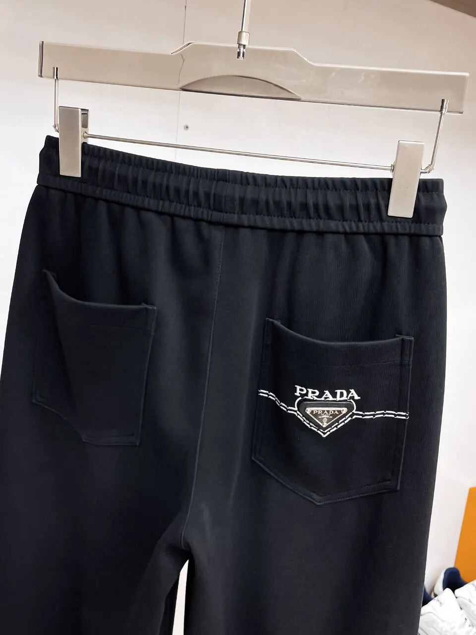 Triangle Badge Seam‑Detail Pants
