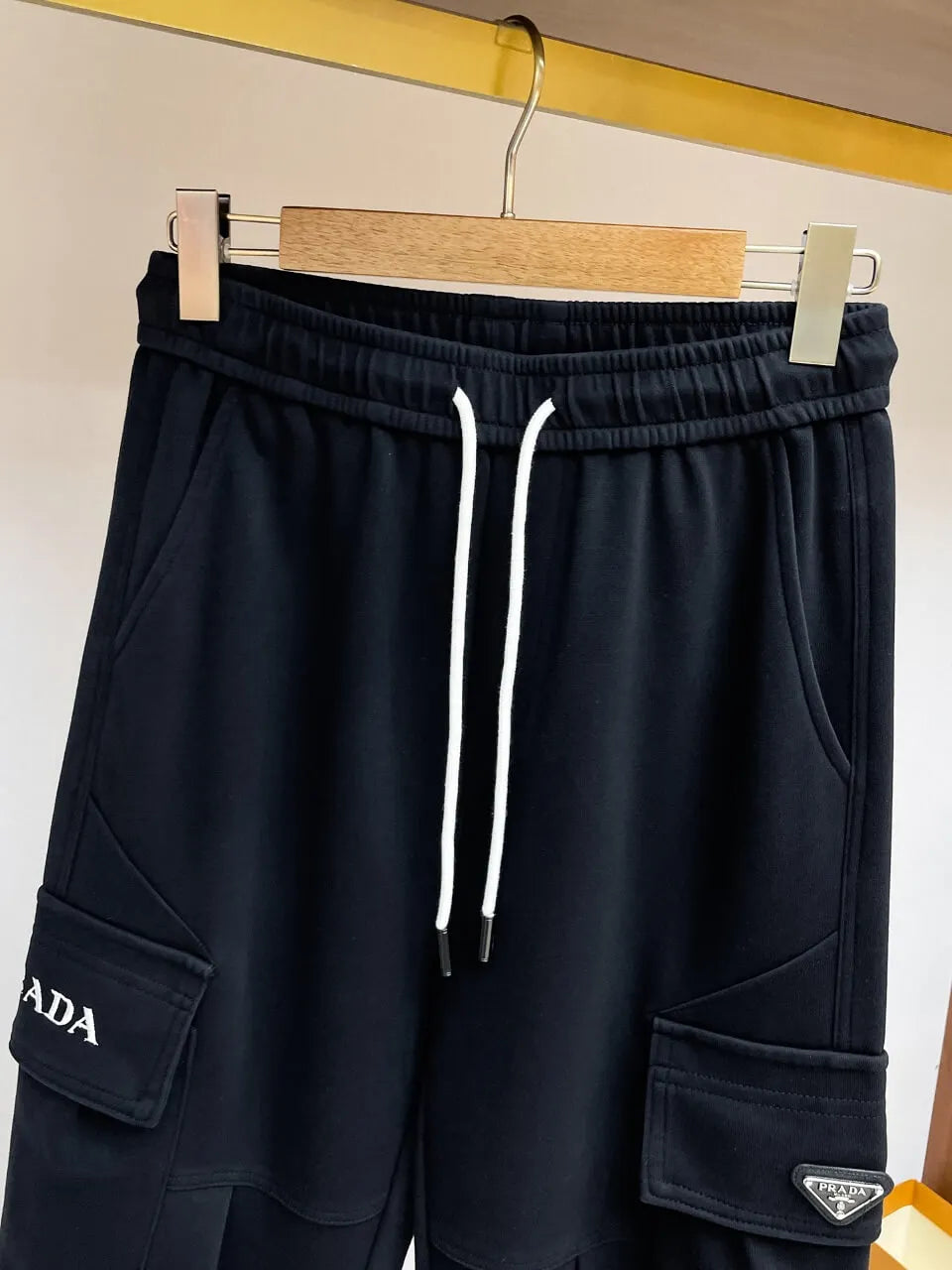 Triangle Badge Multi‑Pocket Cargo Pants