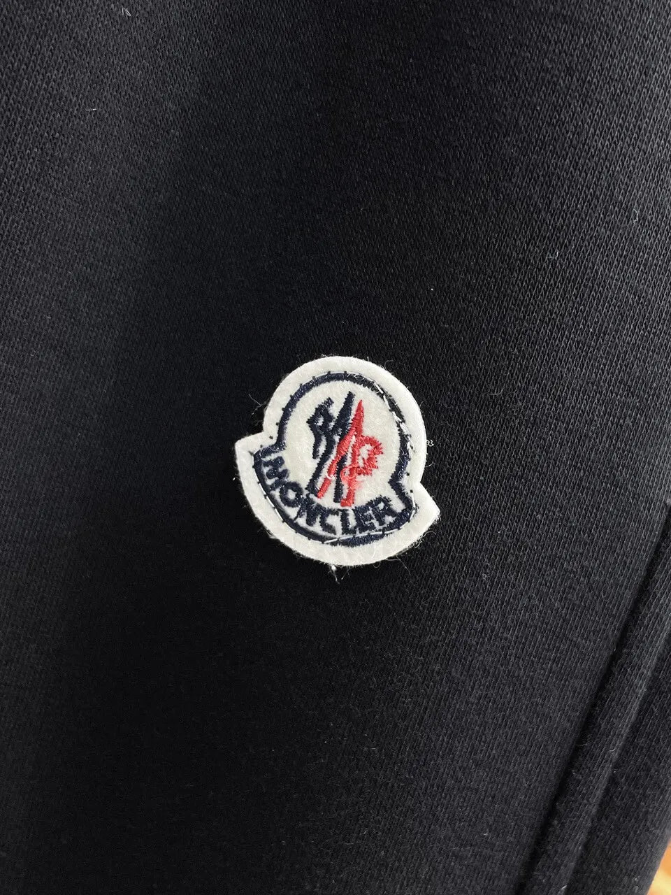 Chest Embroidered Badge Back‑Pocket Motif Pants