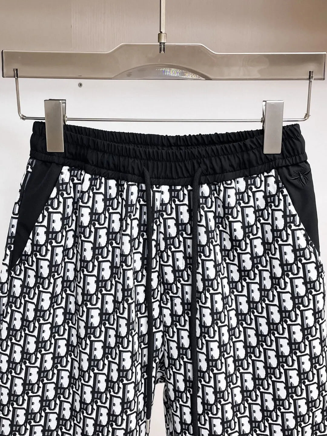 All‑Over Monogram Print Spliced Shorts