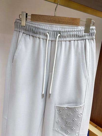 Embossed Monogram Patch Pocket Straight‑Leg Pants