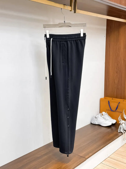 Side‑Embossed Letter Snap‑Detail Pants