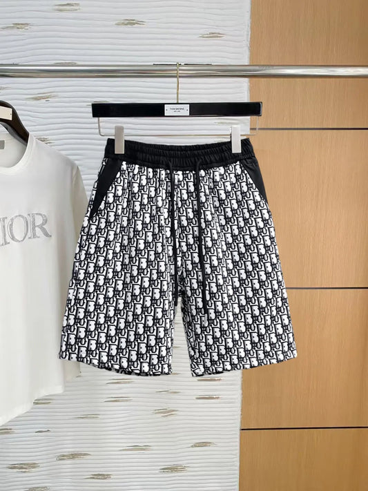 All‑Over Monogram Print Spliced Shorts