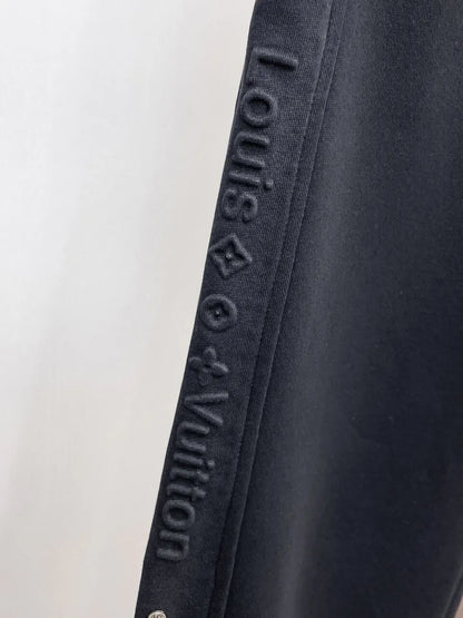 Side‑Embossed Letter Snap‑Detail Pants