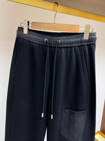 Embossed Monogram Patch Pocket Straight‑Leg Pants