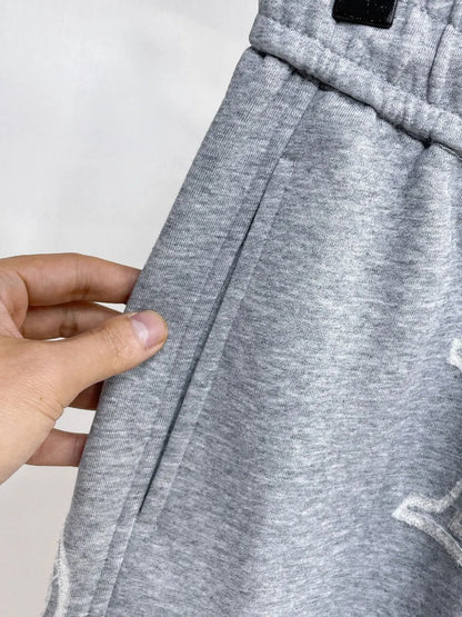 All‑Over Monogram Embroidery sweatpants