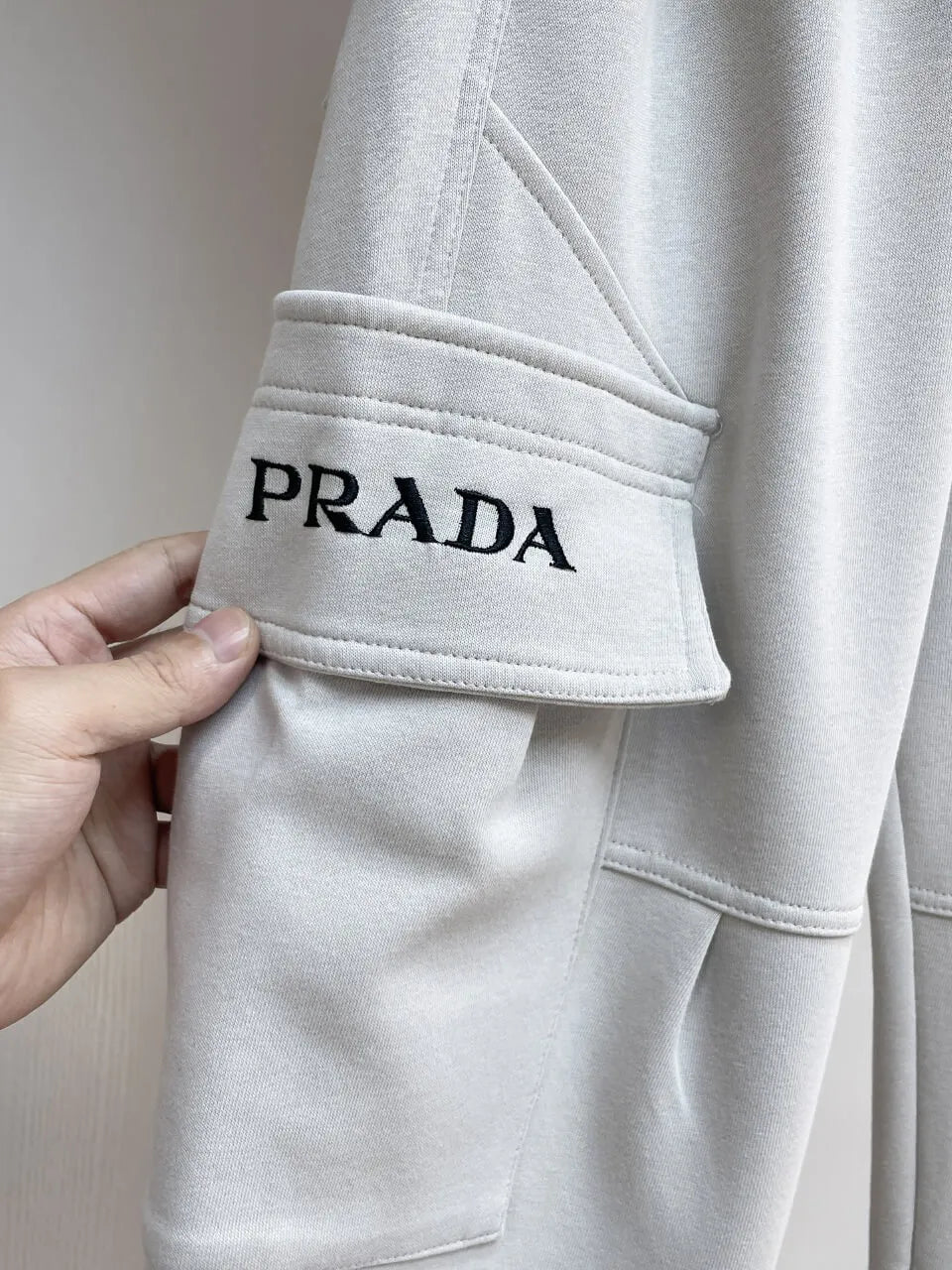 Triangle Badge Multi‑Pocket Cargo Pants