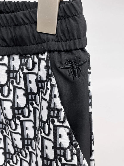 All‑Over Monogram Print Spliced Shorts