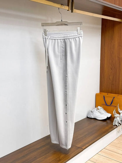 Side‑Embossed Letter Snap‑Detail Pants