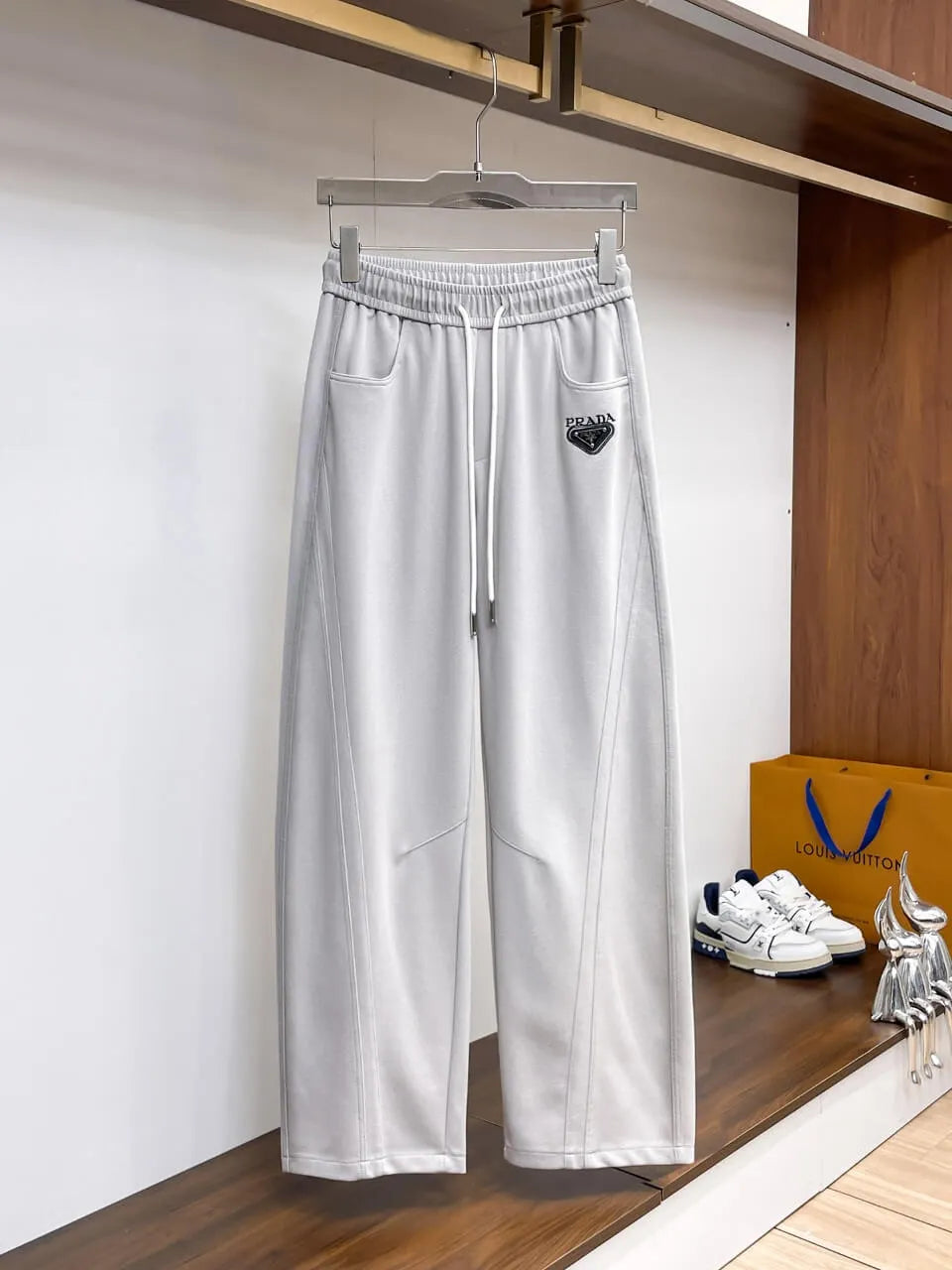 Triangle Badge Seam‑Detail Pants