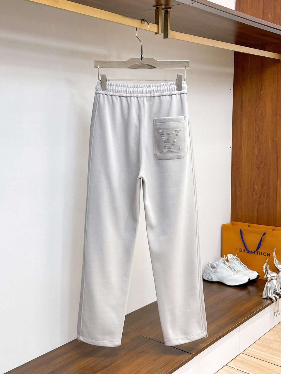 Side‑Embossed Letter Snap‑Detail Pants