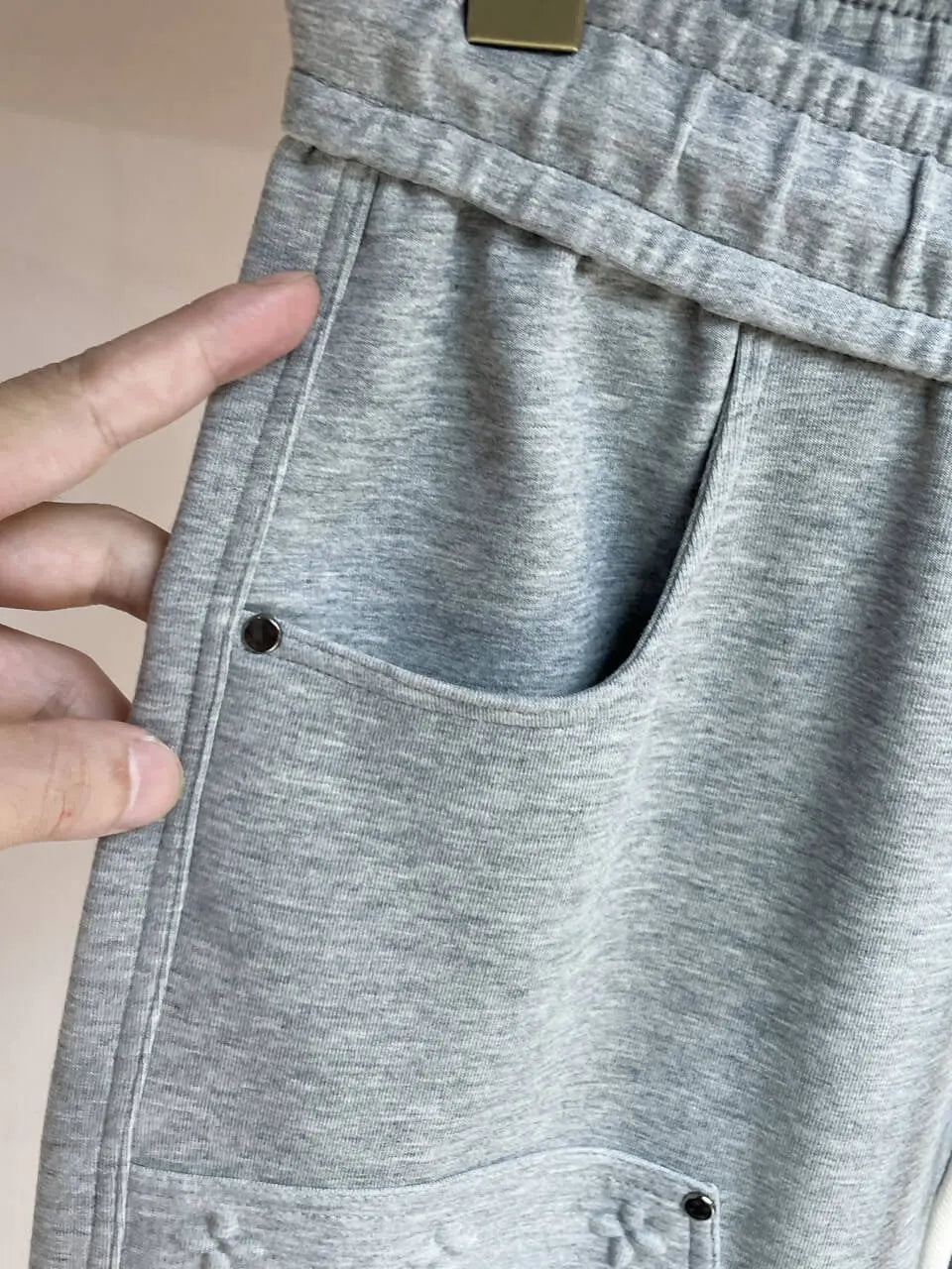 Embossed Monogram Patch Pocket Wide‑Leg Pants